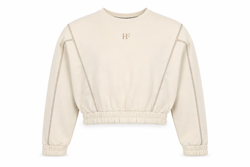 Front view of HOLYFIELD girls’ beige cotton pullover sweatshirt, size 11, years pullover - contrast stitching