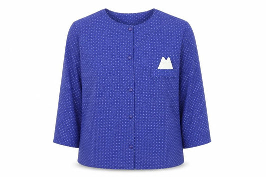Front view of Preworn women’s blue polka dot polyester basic button-up, size UK 12, round neck