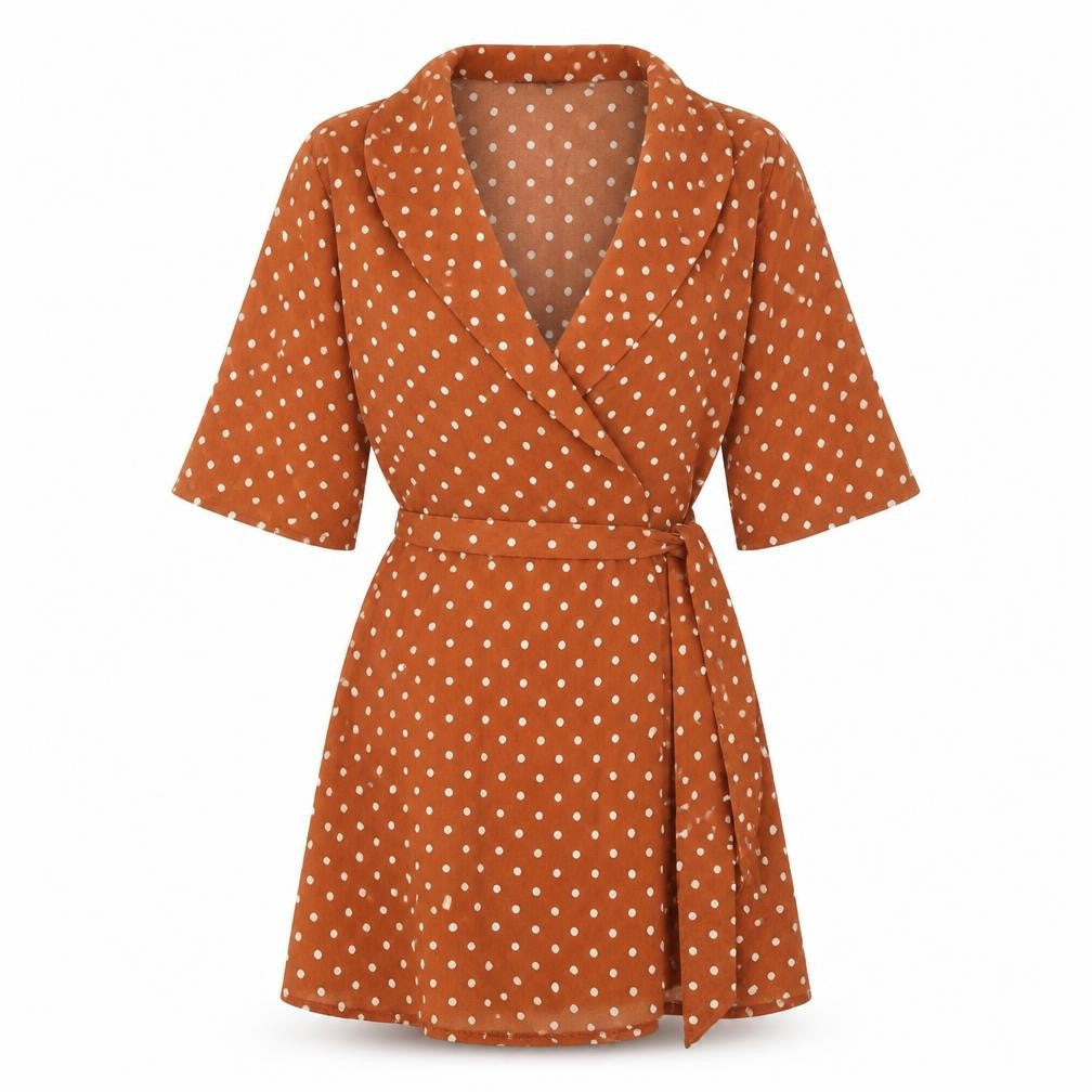 Front view of PRETTYLITTLETHING women’s orange polka dot polyester fit & flare, size UK 6, v-neck tie