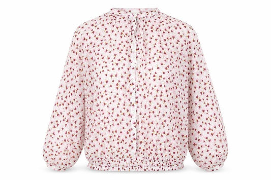 Front view of H&M women’s pink floral lyocell basic button-up, size UK 6, round neck
