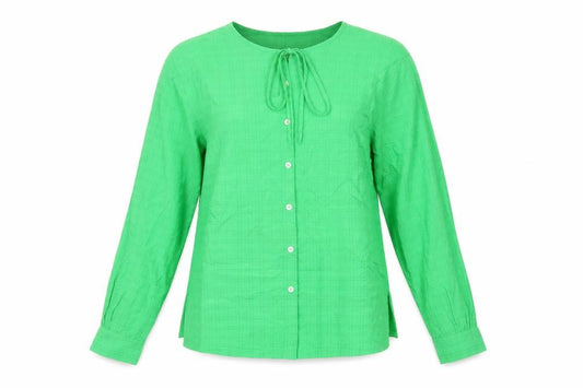 Front view of Marks & Spencer women’s green geometric modal basic button-up, size UK 8, round neck
