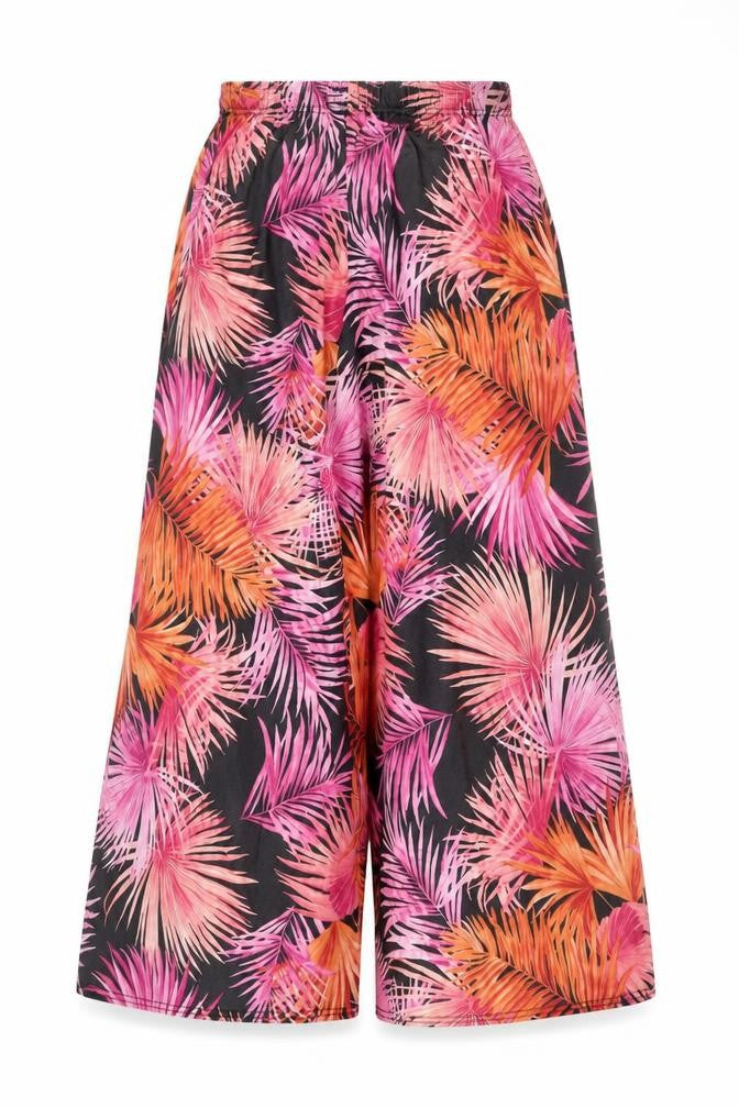 Front view of Decoy women’s pink geometric polyester trousers, size UK 30, in regular