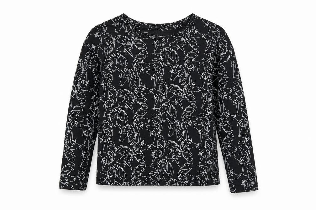 Front view of Tu girls’ black geometric cotton basic blouse, size 6, years scoop neck pullover - unicorn