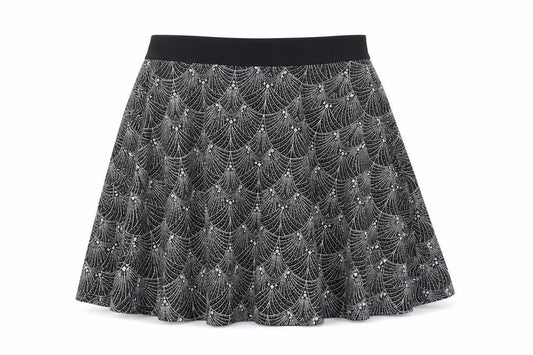 Front view of Preworn women’s black geometric polyester skater skirt, size UK 28, in