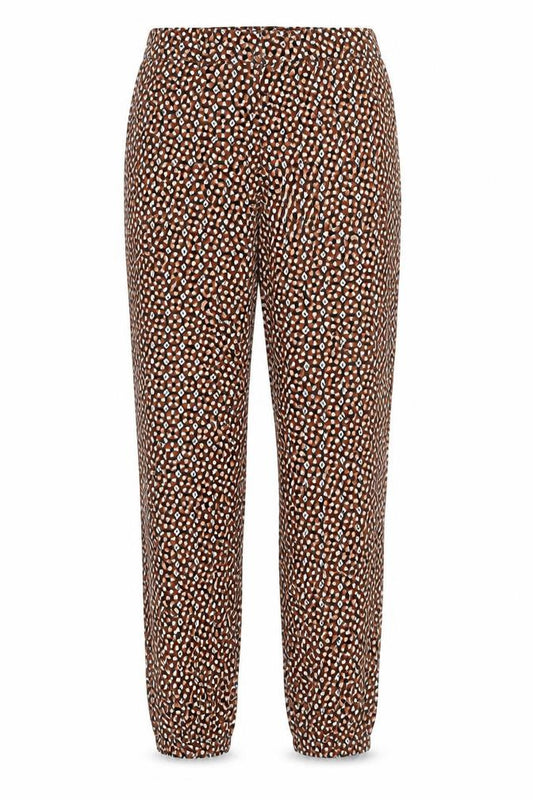 Front view of H&M women’s multicoloured geometric cotton trousers, size UK 4, regular zip
