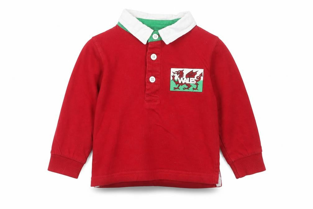Front view of Peacocks boys’ red cotton basic polo, size 12-18, months collared button - wales