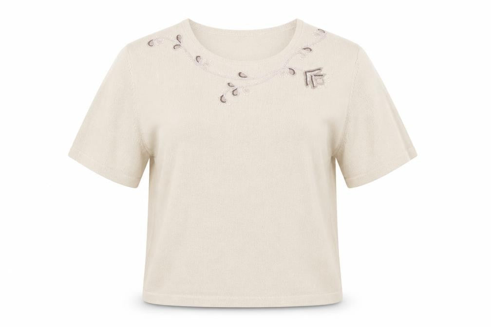Front view of Marks & Spencer women’s beige round neck acrylic jumper, size UK 16