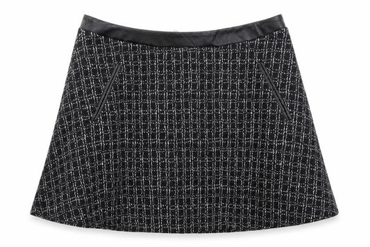 Front view of Yumi women’s black geometric polyester skater skirt, size UK 16, zip
