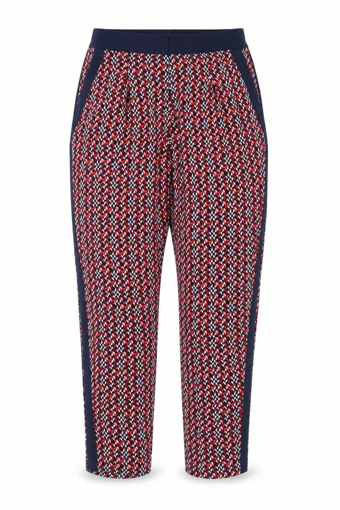 Front view of Marks & Spencer women’s red geometric polyester trousers, size UK 10, regular zip
