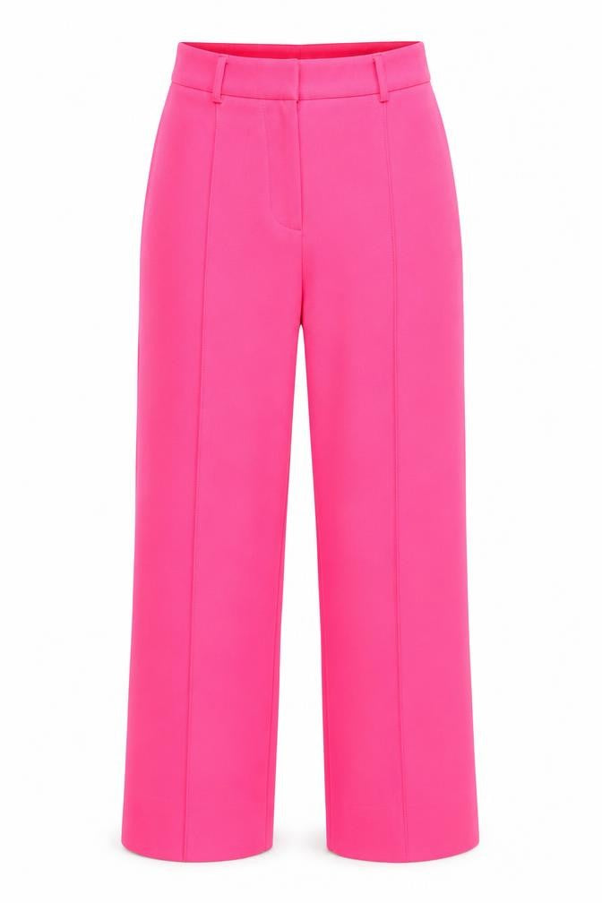 Front view of PRETTYLITTLETHING women’s pink polyester windbreaker trousers, size UK 6, regular zip