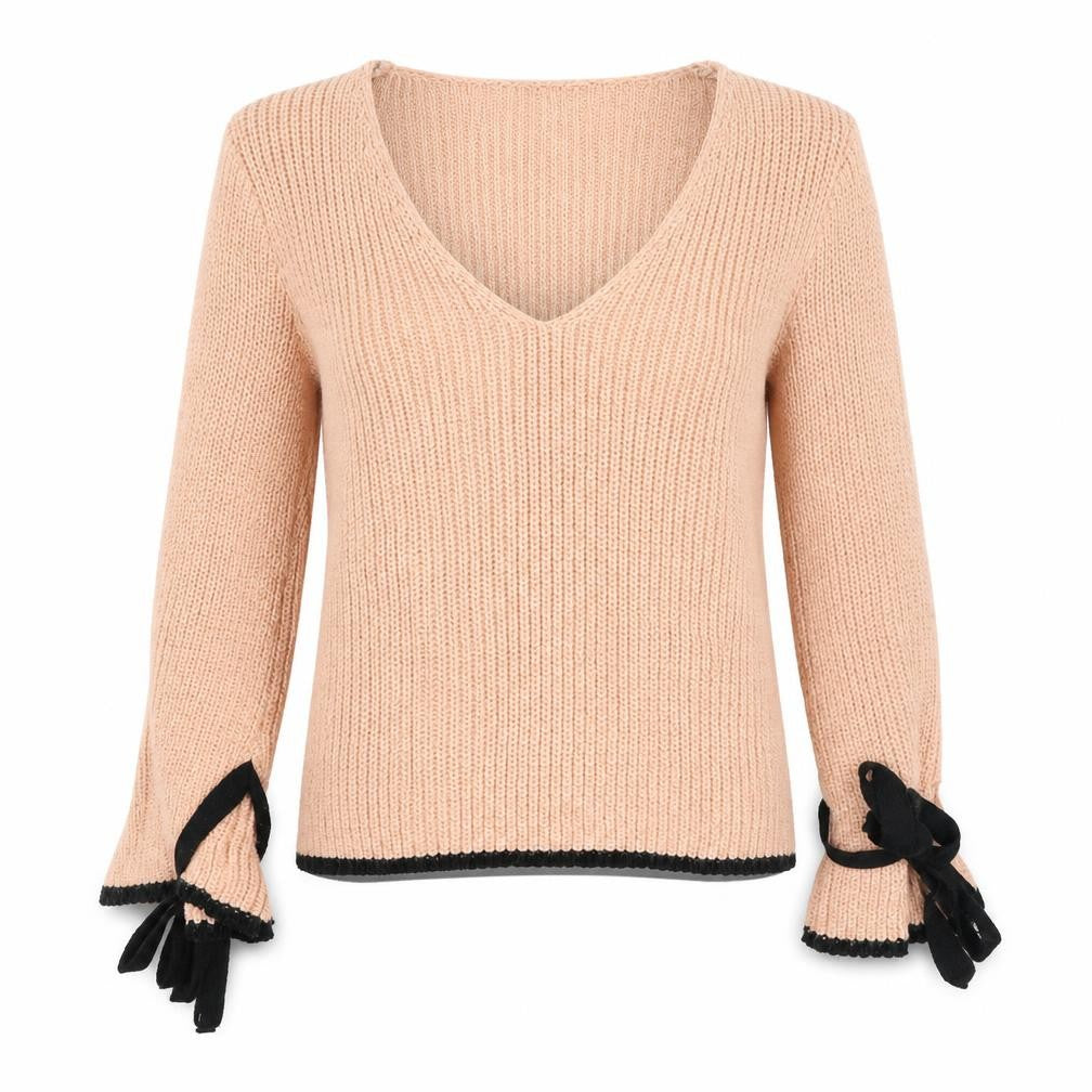 Front view of ASOS women’s pink v-neck acrylic jumper, size UK 8