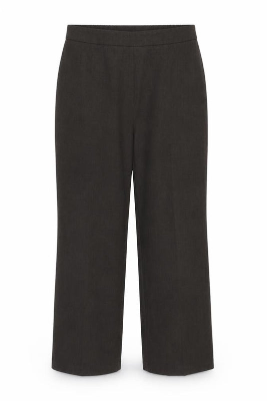 Front view of Marks & Spencer women’s green viscose trousers, size UK 14, regular zip