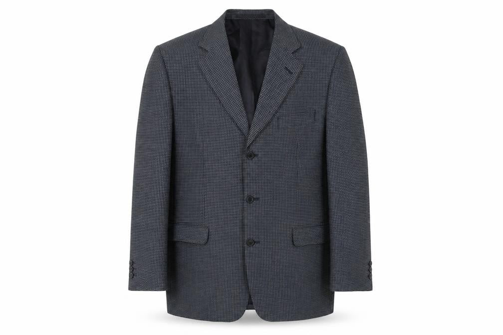 Front view of Marks & Spencer men’s blue geometric wool jacket suit jacket, size 42, regular