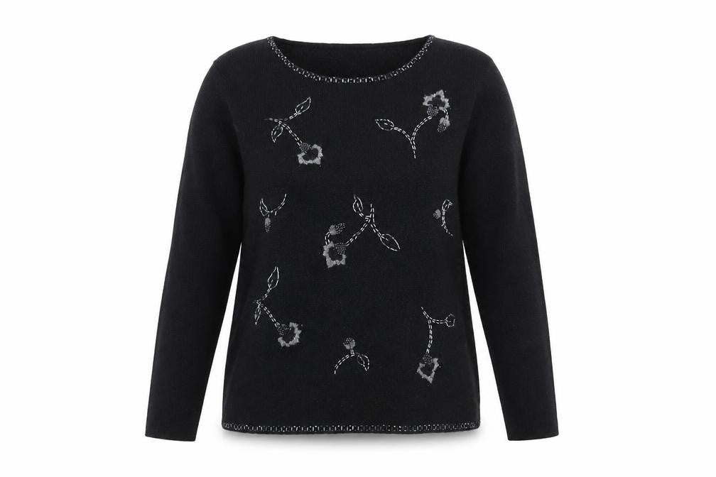 Front view of Marks & Spencer women’s black roll neck acrylic jumper, size UK 10