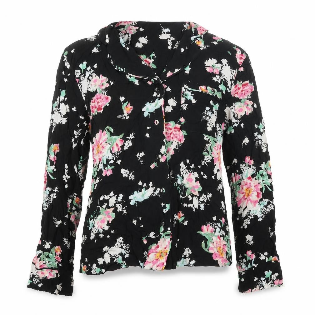 Front view of Marks & Spencer women’s black floral viscose basic button-up, size UK 6, collared