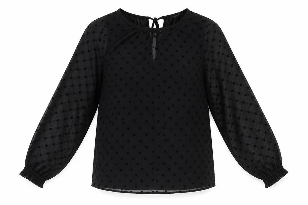 Front view of Marks & Spencer women’s black polka dot polyester basic blouse, size UK 8, round neck
