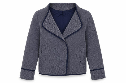 Front view of Monsoon women’s blue geometric jacket, size UK 12, button