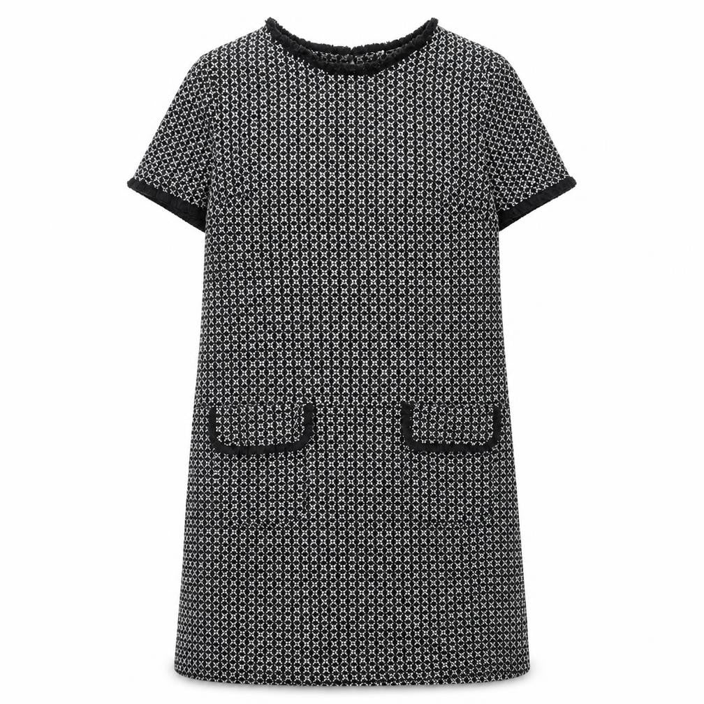 Front view of Quiz women’s black geometric polyester a-line, size UK 12, round neck button