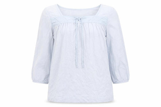 Front view of Uniqlo women’s blue cotton basic t-shirt, size XS, round neck