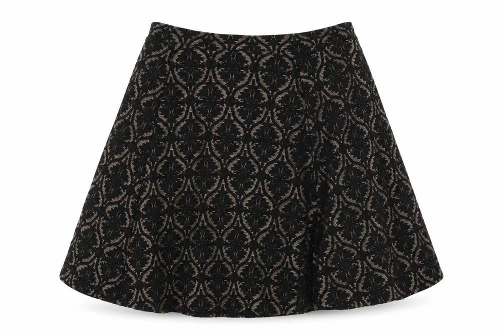 Front view of Marks & Spencer women’s black geometric polyester swing skirt, size UK 28, in