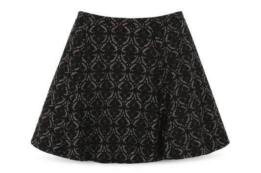 Front view of Marks & Spencer women’s black geometric polyester swing skirt, size UK 28, in
