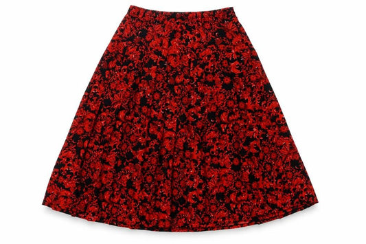 Front view of Ottima women’s red geometric polyester pleated skirt, size UK 30, in