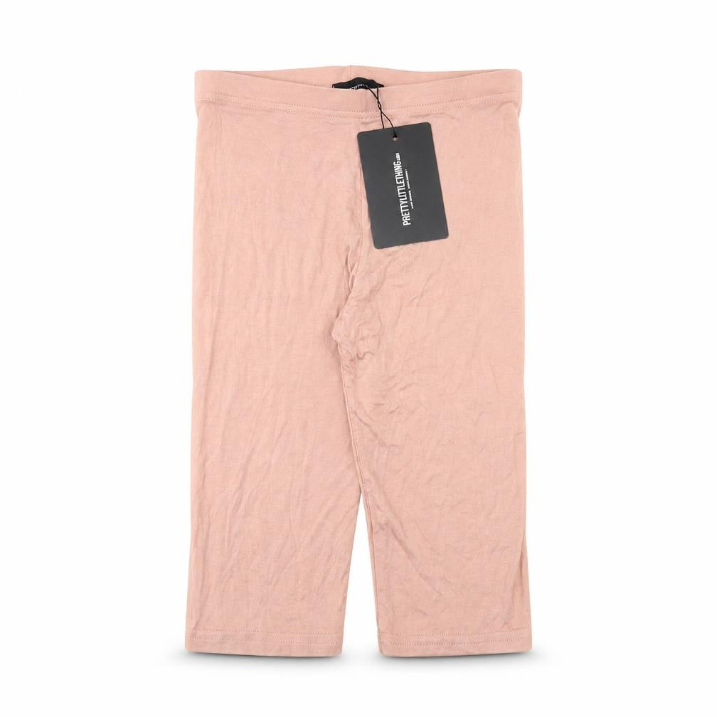 Front view of PRETTYLITTLETHING women’s pink viscose sweat shorts, size UK 4, regular