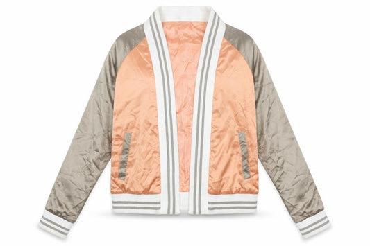 Front view of QED London women’s orange jacket, size UK 12, - flower detail