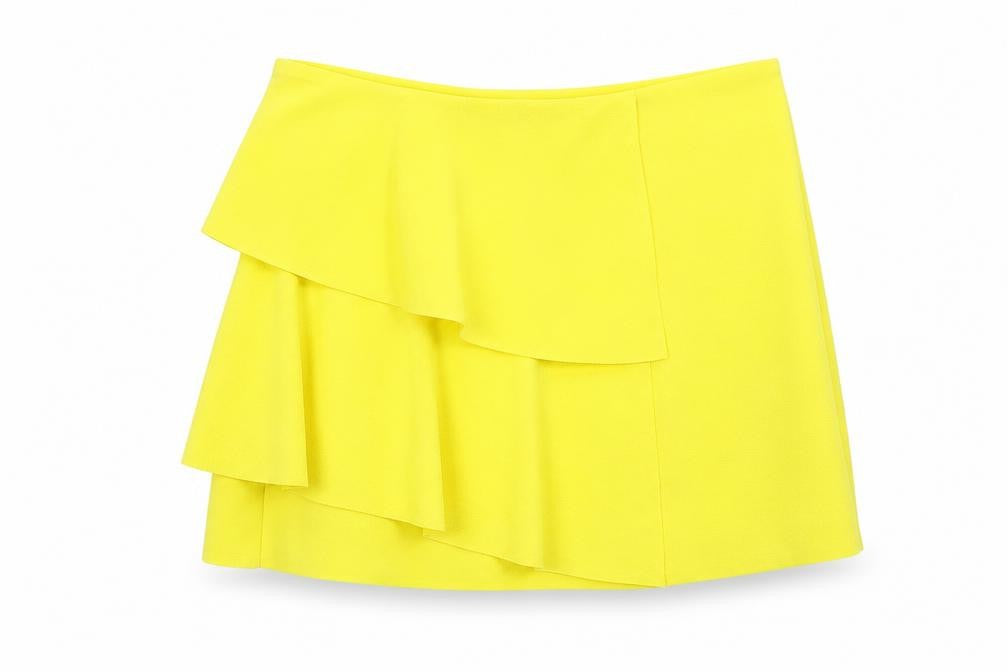 Front view of Vero & Lucy women’s yellow polyester mini skirt, size M, zip