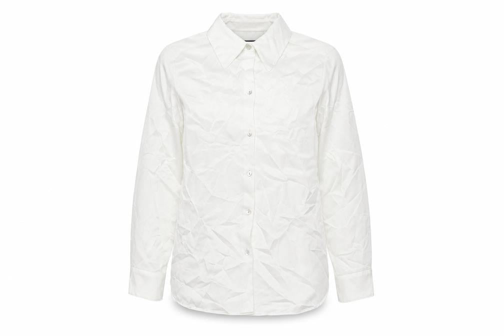 Front view of Marks & Spencer women’s ivory polyester basic button-up, size UK 12, collared
