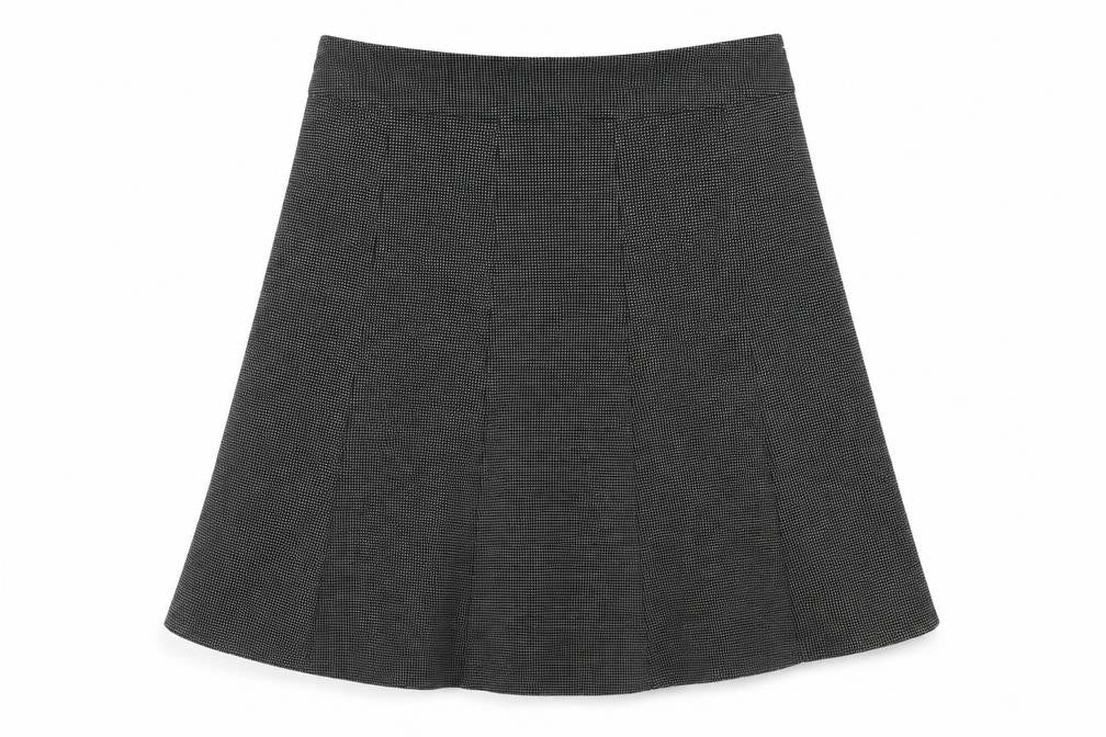 Front view of Next women’s black polka dot polyester swing skirt, size UK 14, zip