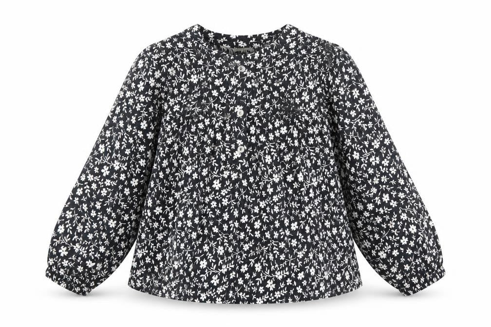 Front view of Zara girls’ black floral polyester basic blouse, size 8, years boat neck button