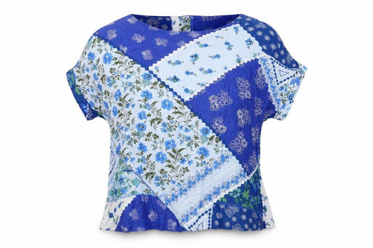 Front view of Marks & Spencer women’s blue geometric viscose basic blouse, size UK 12, round neck