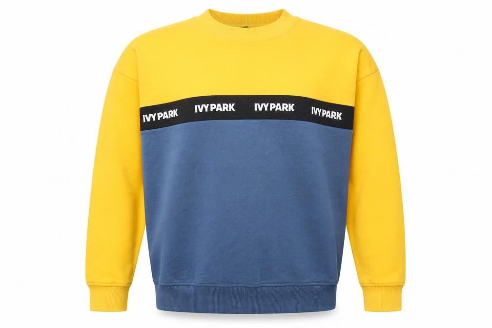Front view of IVY PARK men’s blue polyester pullover sweatshirt, size XS, - colourblock
