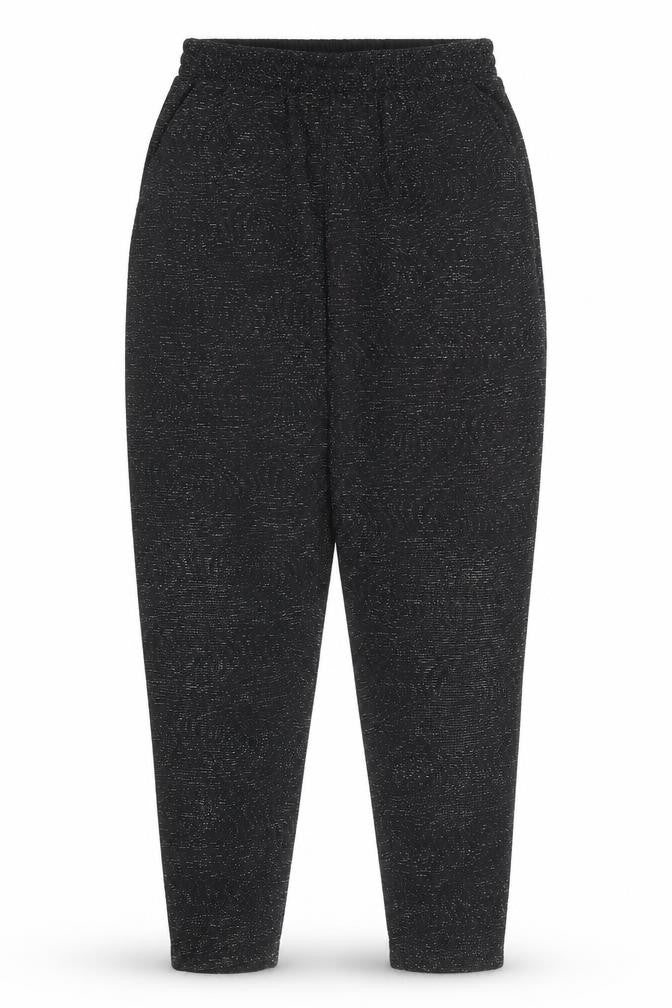 Front view of H&M women’s black geometric polyester carrot trousers, size S, regular