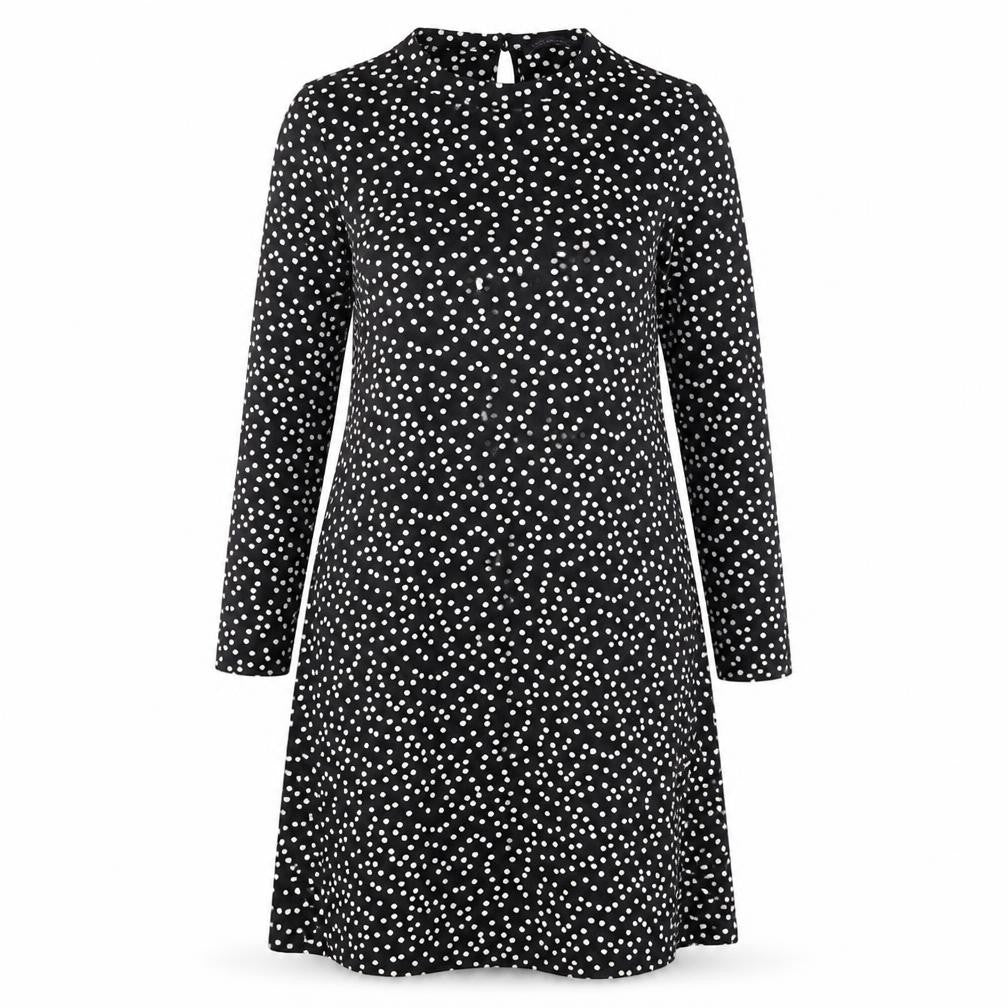 Front view of Marks & Spencer women’s black polka dot viscose a-line, size UK 12, round neck button