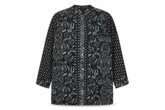 Front view of H&M women’s black geometric polyester kimono blouse, size UK 8, v-neck