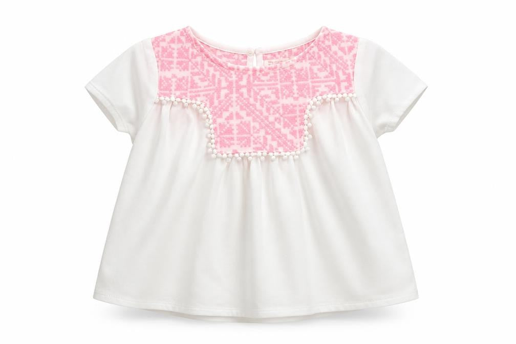 Front view of Zara girls’ white polyester basic blouse, size 4, years round neck button