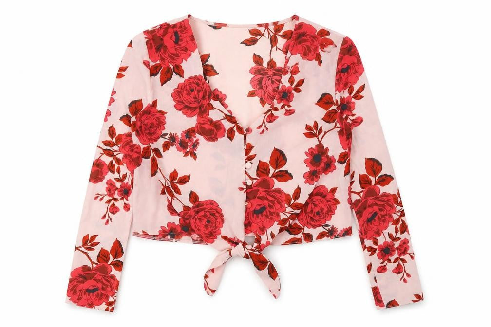 Front view of Missguided women’s pink floral polyester basic button-up, size UK 8, v-neck - knot front