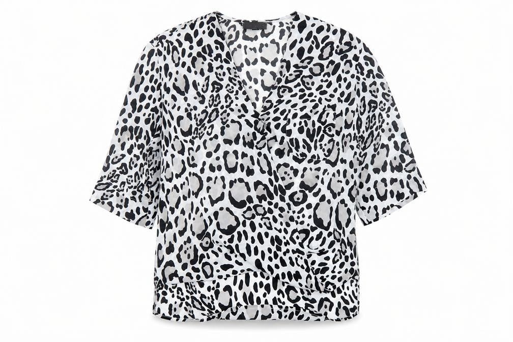 Front view of Topshop women’s black animal print polyester basic blouse, size UK 6, v-neck - wrap front detail