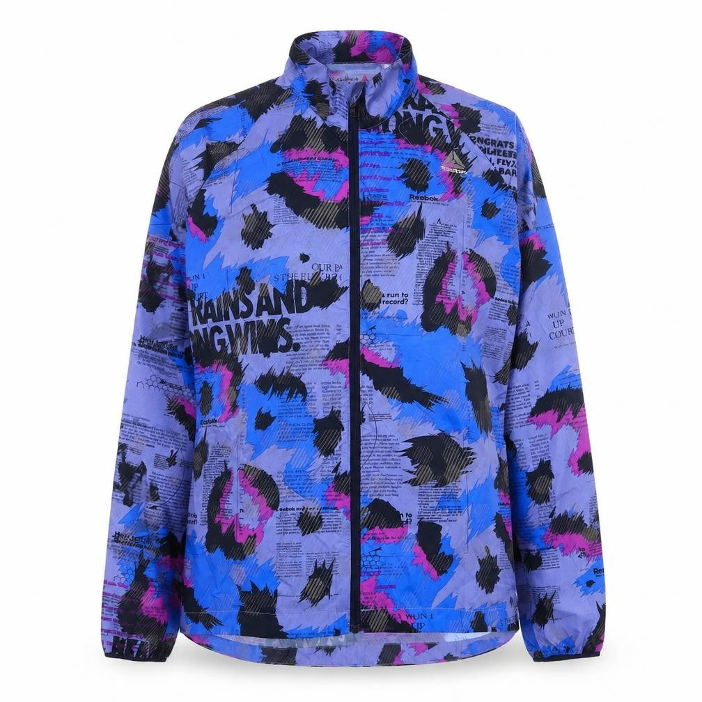 Front view of Reebok women’s multicoloured geometric windbreaker jacket, size S, zip
