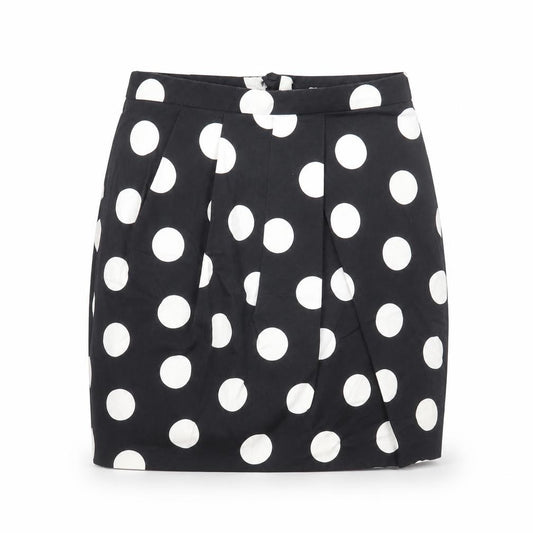 Front view of ASOS women’s black polka dot cotton a-line skirt, size UK 8, zip