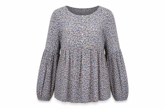 Front view of Zara women’s blue floral polyester basic blouse, size L, round neck