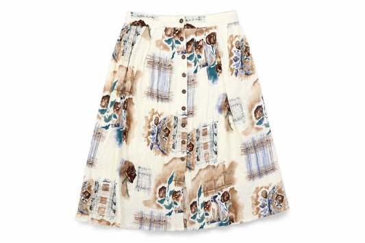 Front view of Hamells women’s white geometric viscose swing skirt, size UK 12, button