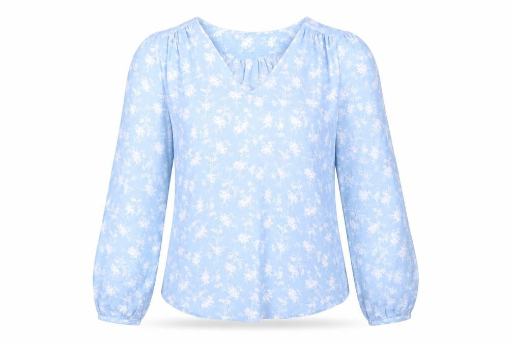 Front view of Per Una women’s blue floral viscose basic blouse, size UK 8, v-neck