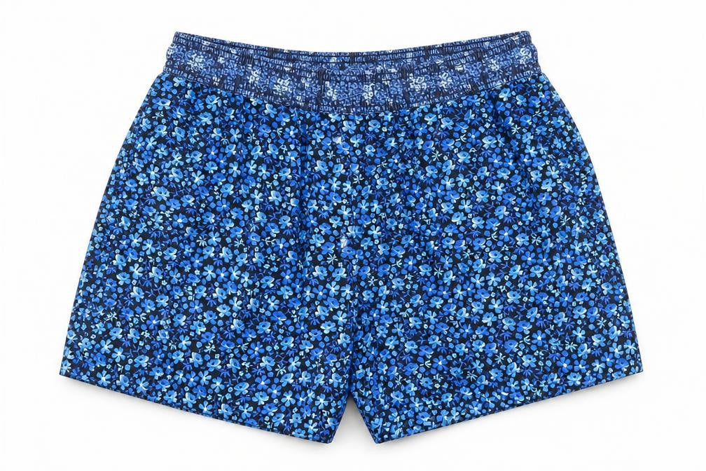 Front view of Topman men’s blue floral polyester sweat shorts, size S, regular