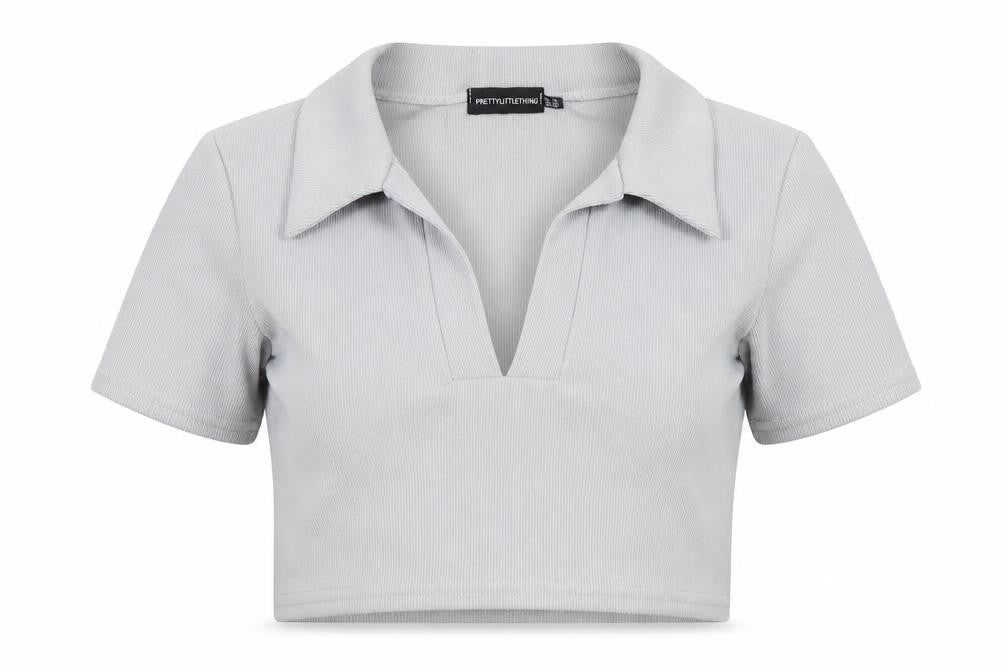 Front view of PRETTYLITTLETHING women’s grey polyester cropped polo, size UK 12, collared - ribbed