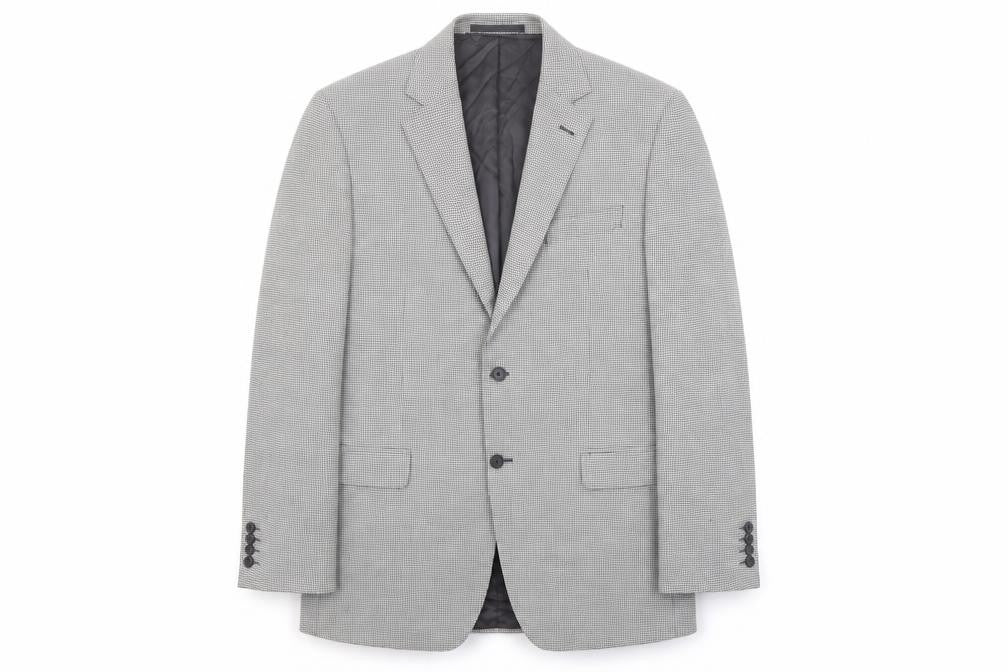 Front view of Marks & Spencer men’s black geometric wool jacket suit jacket, size 42, regular