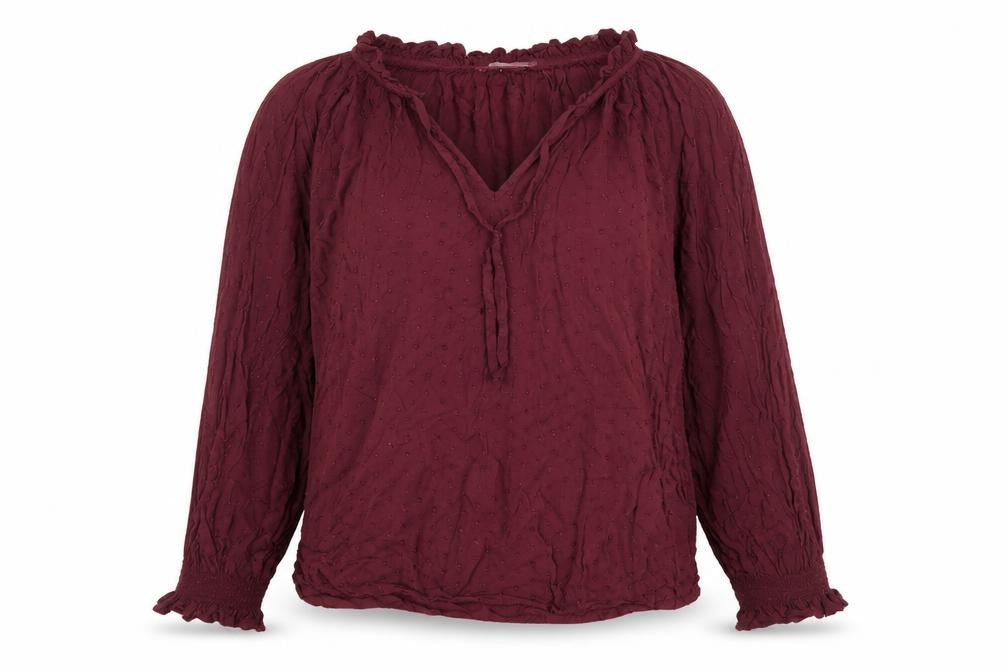 Front view of H&M women’s red polka dot viscose basic blouse, size UK 8, v-neck