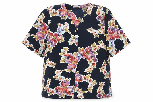 Front view of Carousel women’s blue floral polyester basic button-up, size UK 20, v-neck